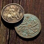 Various methods of cleaning old coins, including tips, tricks, and tricks