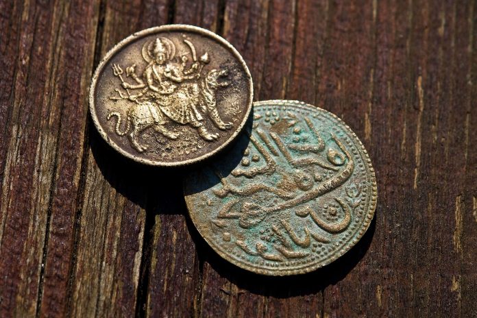 Various methods of cleaning old coins, including tips, tricks, and tricks